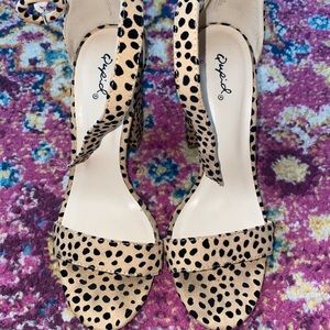 Brown and black Dalmatian heels